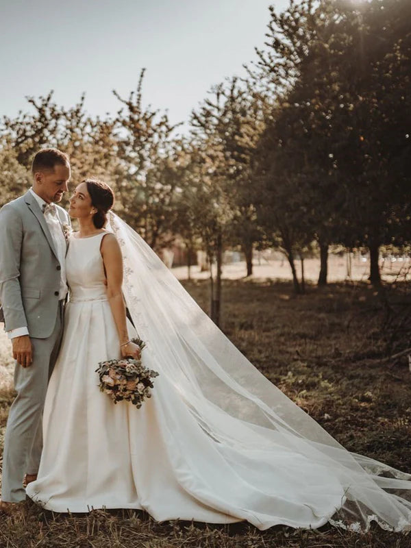 Luolandi Simple A-Line Satin Beaded Bowknot Backless Sleeveless Wedding Dresses With Bow