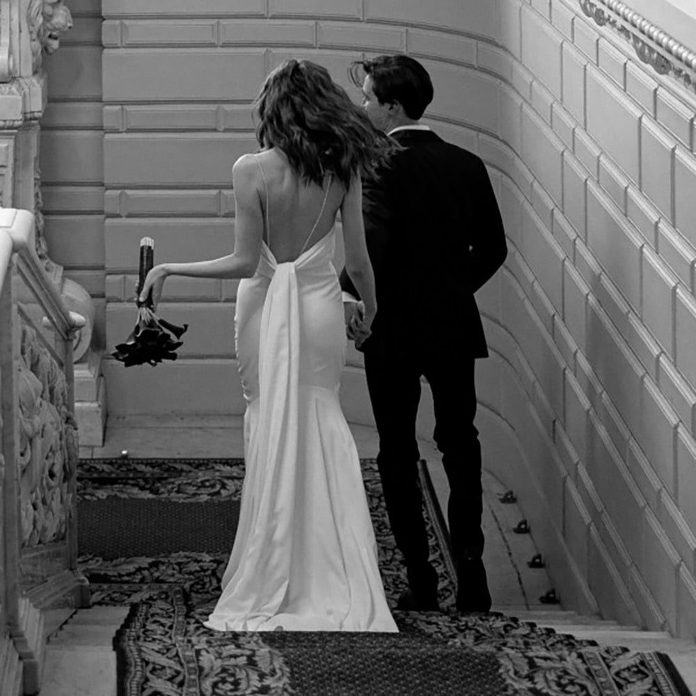 Luolandi Simple Beach Spaghetti Straps Satin Backless Buttons Ribbon Trailing Wedding Dresses Sexy