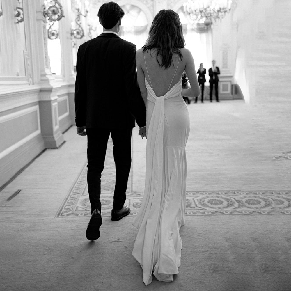 Luolandi Simple Beach Spaghetti Straps Satin Backless Buttons Ribbon Trailing Wedding Dresses Sexy