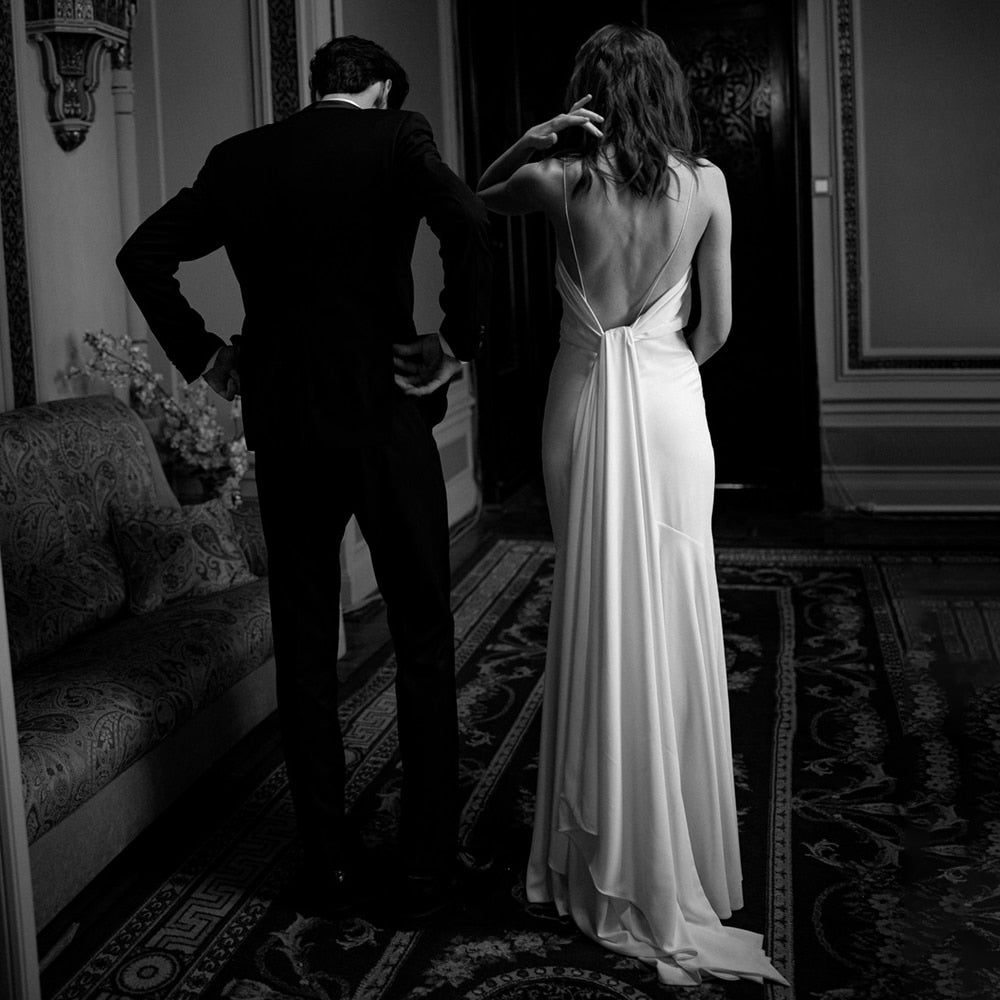 Luolandi Simple Beach Spaghetti Straps Satin Backless Buttons Ribbon Trailing Wedding Dresses Sexy