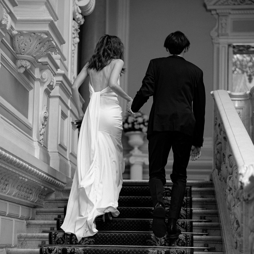 Luolandi Simple Beach Spaghetti Straps Satin Backless Buttons Ribbon Trailing Wedding Dresses Sexy