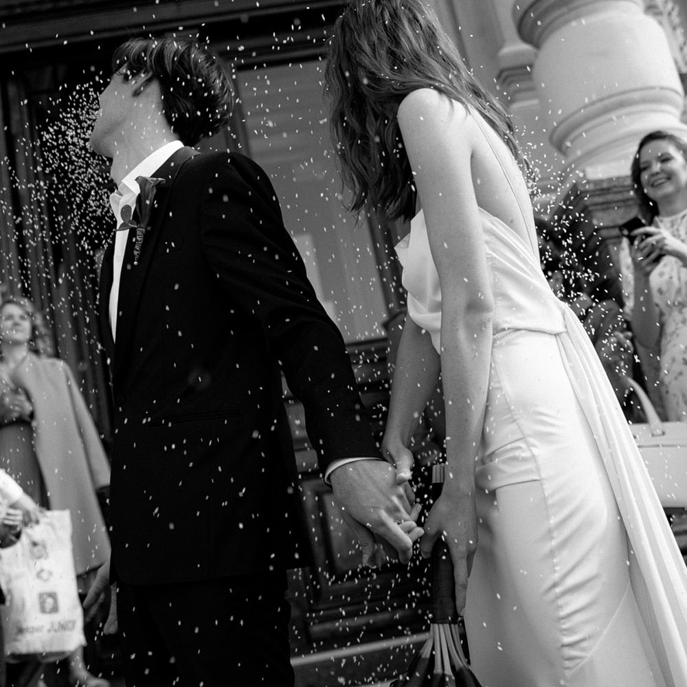 Luolandi Simple Beach Spaghetti Straps Satin Backless Buttons Ribbon Trailing Wedding Dresses Sexy