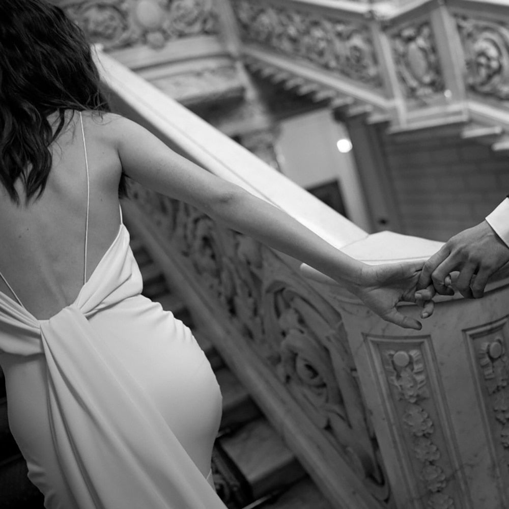 Luolandi Simple Beach Spaghetti Straps Satin Backless Buttons Ribbon Trailing Wedding Dresses Sexy