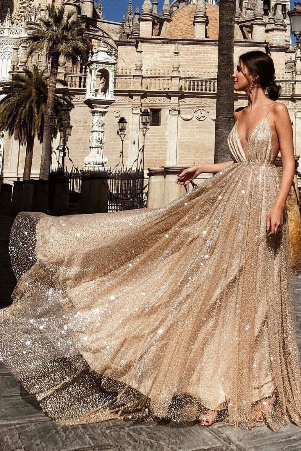 Luolandi Sexy A line Deep V Neck Spaghetti Straps Backless Prom Dresses Sequins Long Sparkly Evening Dresses