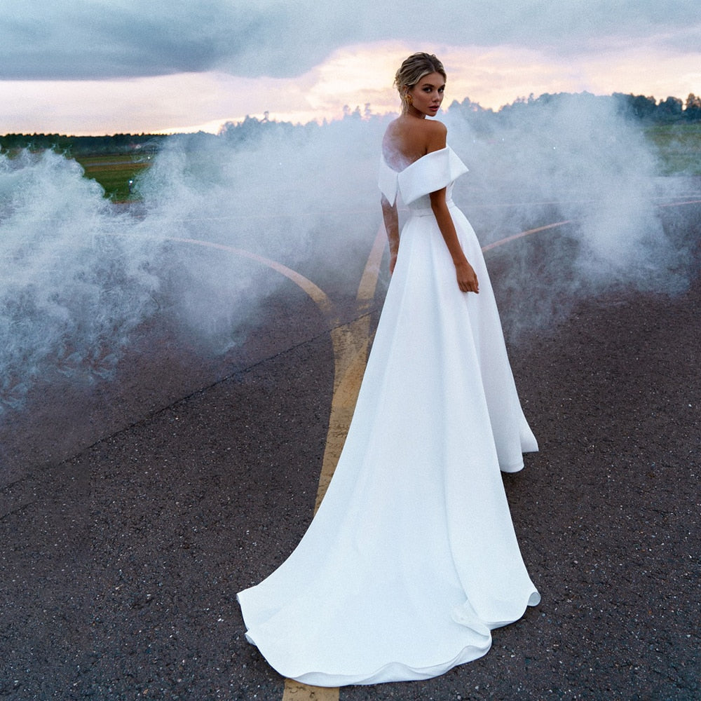 Luolandi Simple Off the Shoulder Satin Sheath Ruched Wedding Dress With Detachable Overskirt Sexy