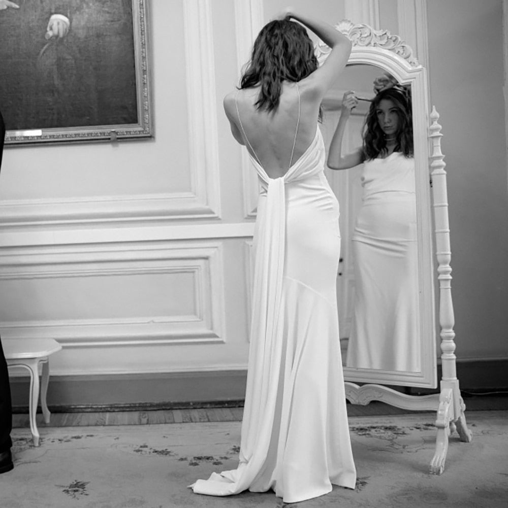 Luolandi Simple Beach Spaghetti Straps Satin Backless Buttons Ribbon Trailing Wedding Dresses Sexy