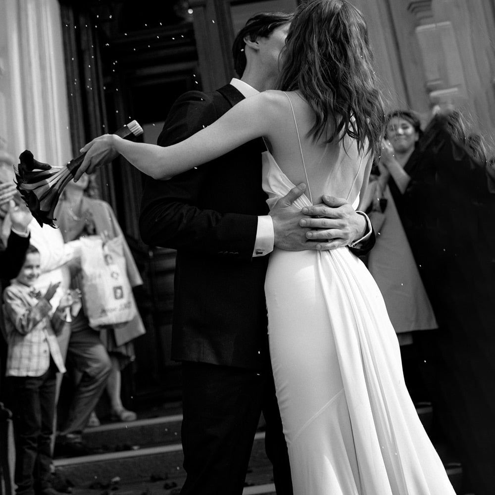 Luolandi Simple Beach Spaghetti Straps Satin Backless Buttons Ribbon Trailing Wedding Dresses Sexy