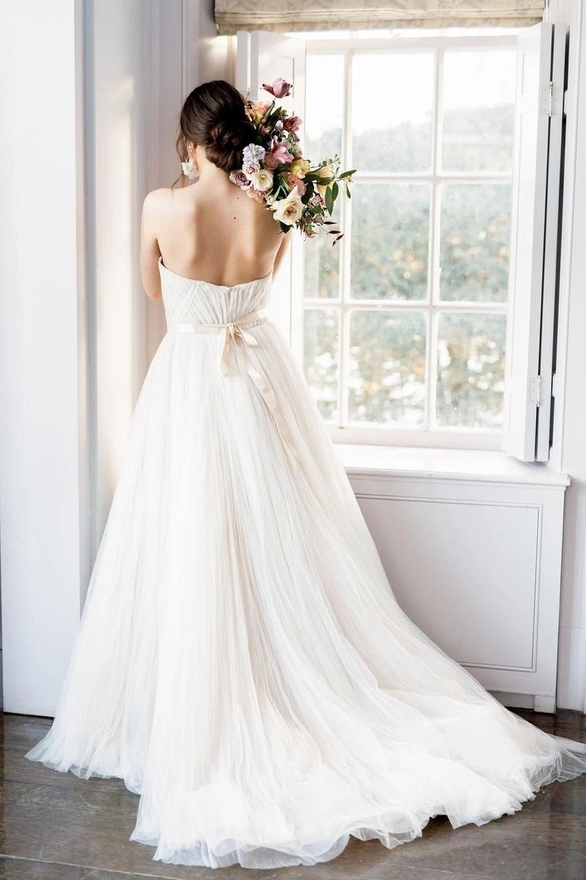 Luolandi A Line Tulle Strapless Backless Wedding Dresses With Belt Sweep Train Sleeveless Beach Wedding Dress Sexy