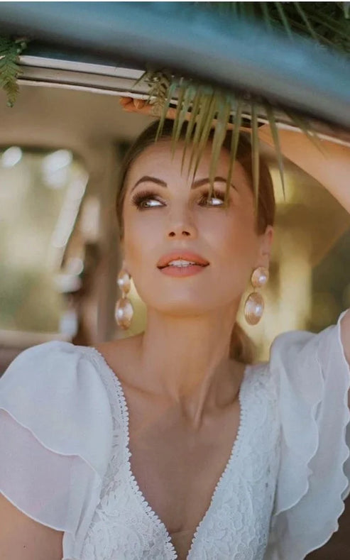 Luolandi A Line V-neck Lace Floor-length Short Sleeve Wedding Dress with Ruffles