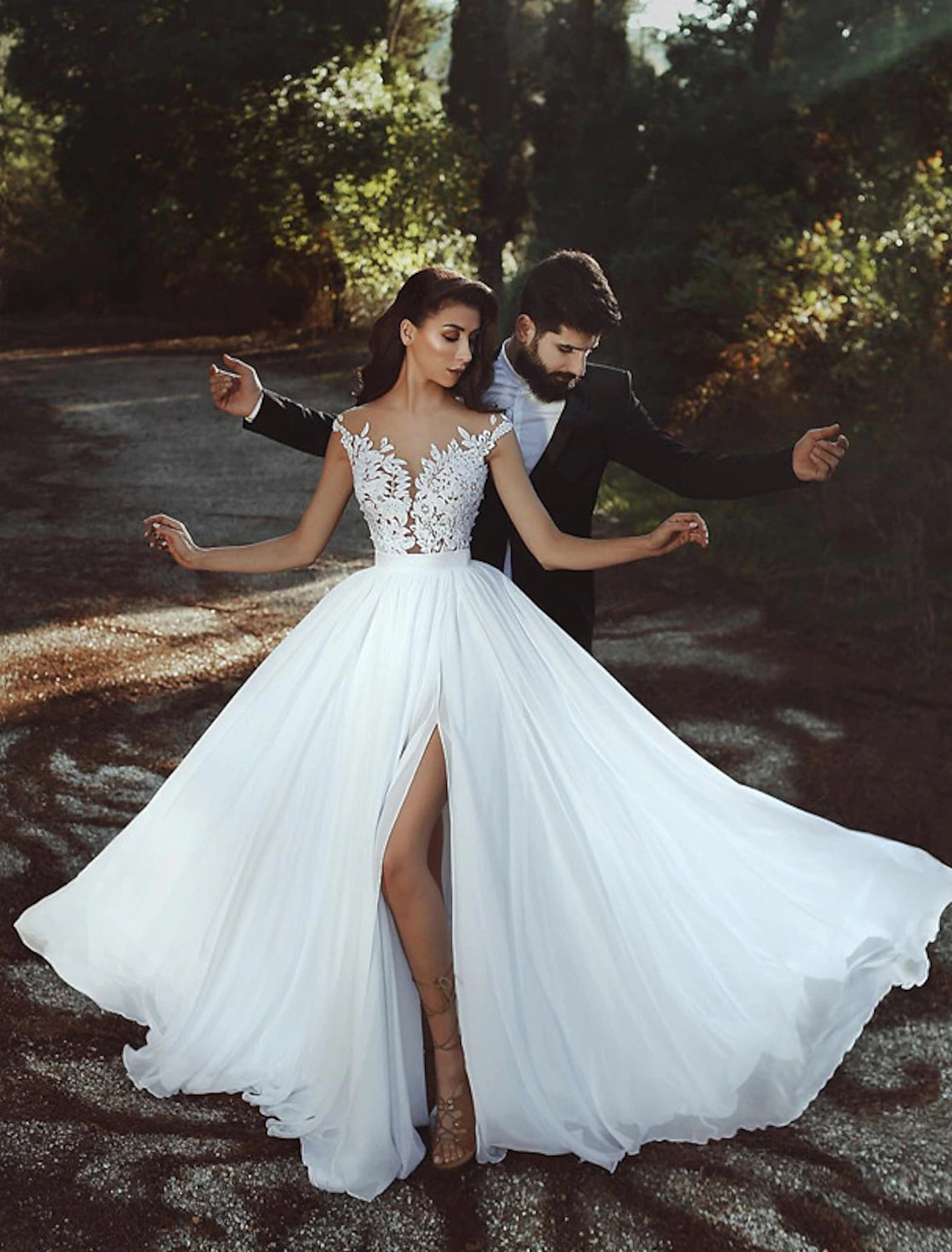 Luolandi Beach Open Back Wedding Dresses A-Line Illusion Neck Cap Sleeve Court Train Chiffon Bridal Gowns With Pleats