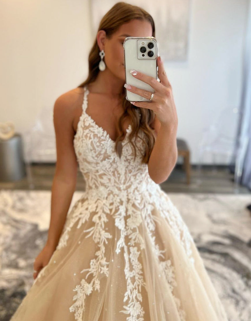 Luolandi A-Line Sexy Backless Long Prom Dress With Appliques V-neck Champagne Beautiful