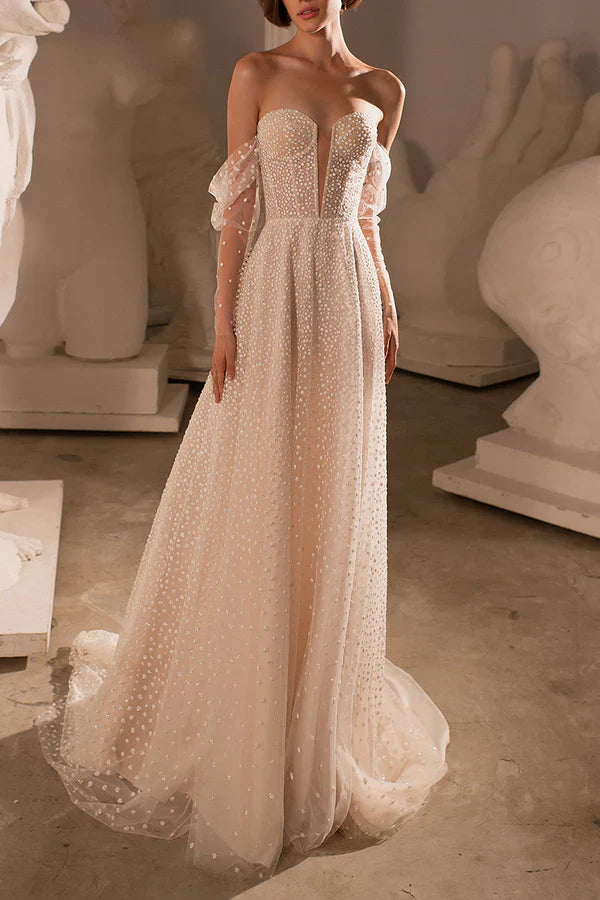 Luolandi A charming deep V-neck bohemian beach wedding dress paired with a court train Beautiful