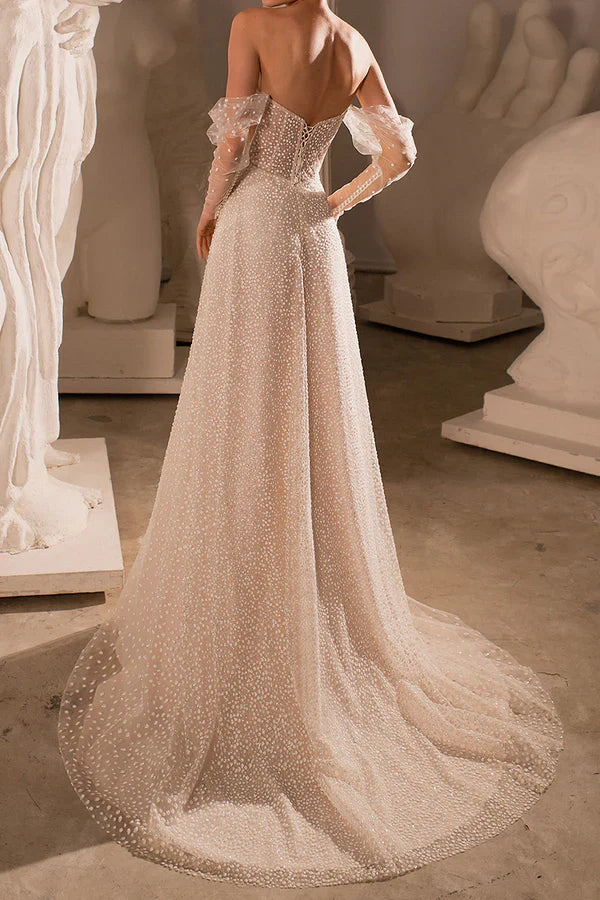Luolandi A charming deep V-neck bohemian beach wedding dress paired with a court train Beautiful