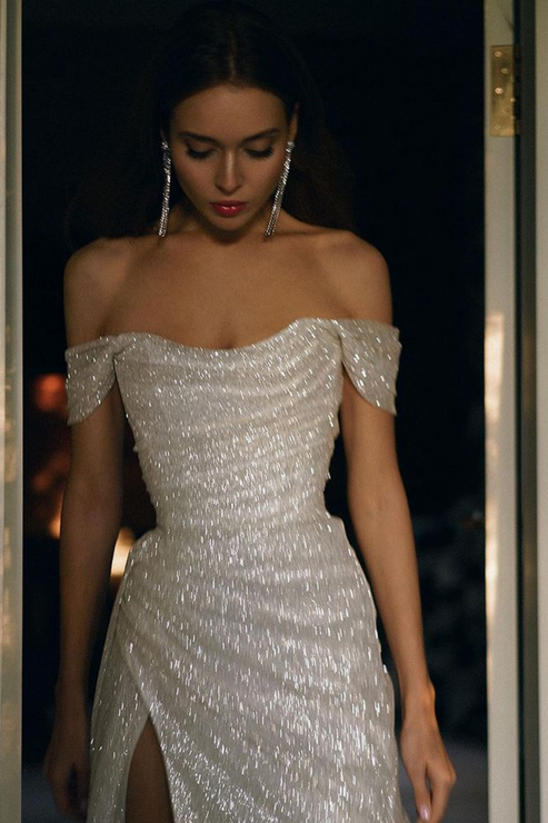 Luolandi Elegant Mermaid Off the Shoulder Silver Sequins Long Prom Dress with Split Front Sparkly Evening Dress