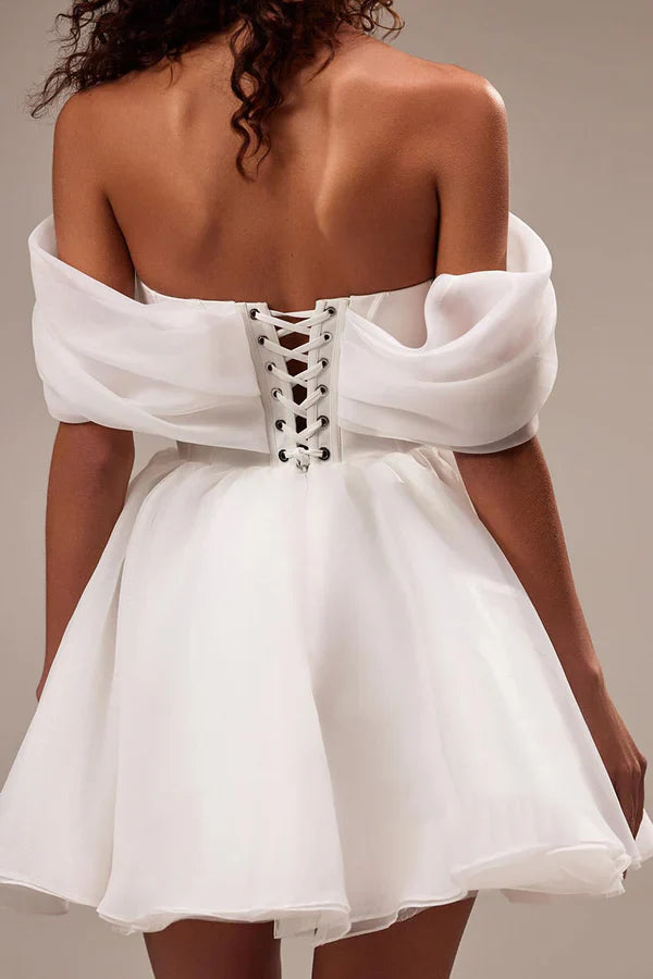 Luolandi Unique sheer A-shaped off shoulder strap short wedding dress Sexy